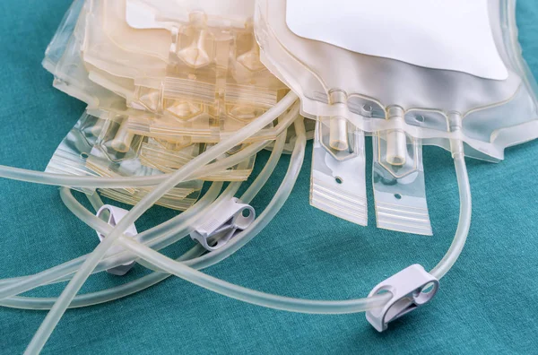 Empty blood bags at a hospital table, conceptual image