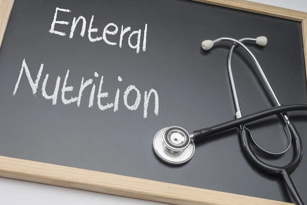 Enteral beslenme bir yazı tahtası, kavramsal görüntü, yatay kompozisyon yazılı