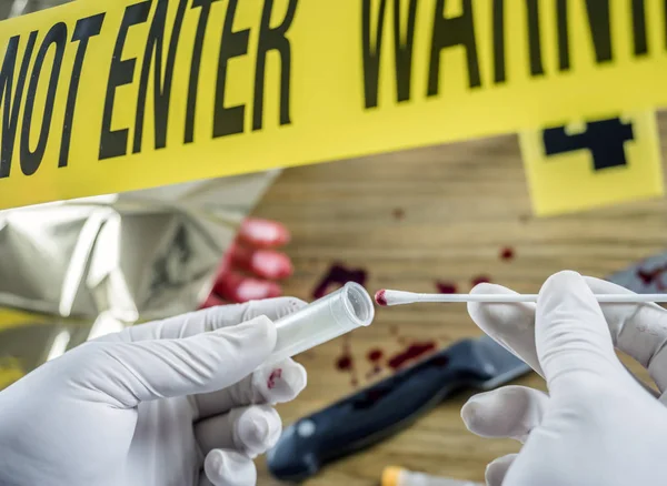 Crime scene for cutting weapon, Judicial police takes blood samples in scene of murder, conceptual image, conceptual image