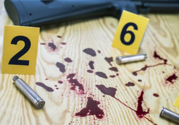 Scene of the crime, traces of blood and bullet casings, conceptual image, composition horizontal — Stock Photo, Image