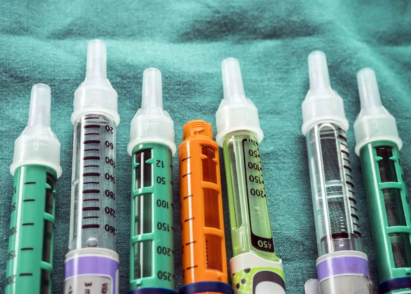 Several Injectors of insulin, conceptual image, composition horizontal — Stock Photo, Image