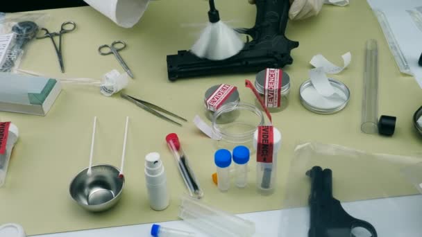 Scientific Police Officer Analyzes Gun Find Traces Conceptual Image — Stock Video