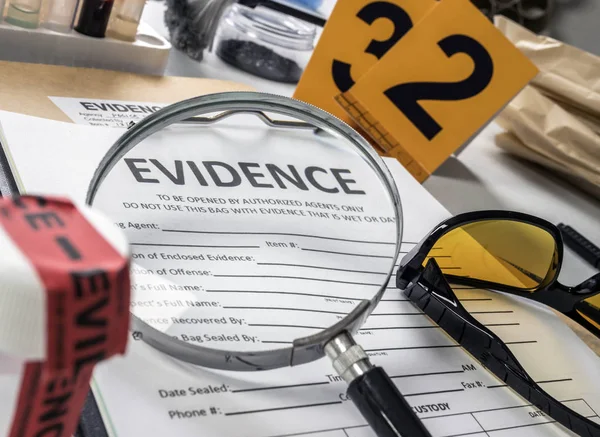 Basic research utensils with a evidence bag in Laboratory forensic equipment, conceptual image — Stock Photo, Image