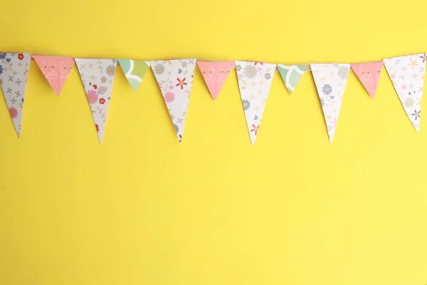 colorful party flags and triangular shape