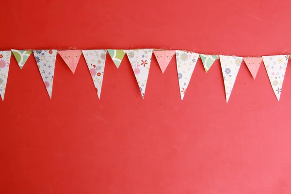 colorful party flags and triangular shape