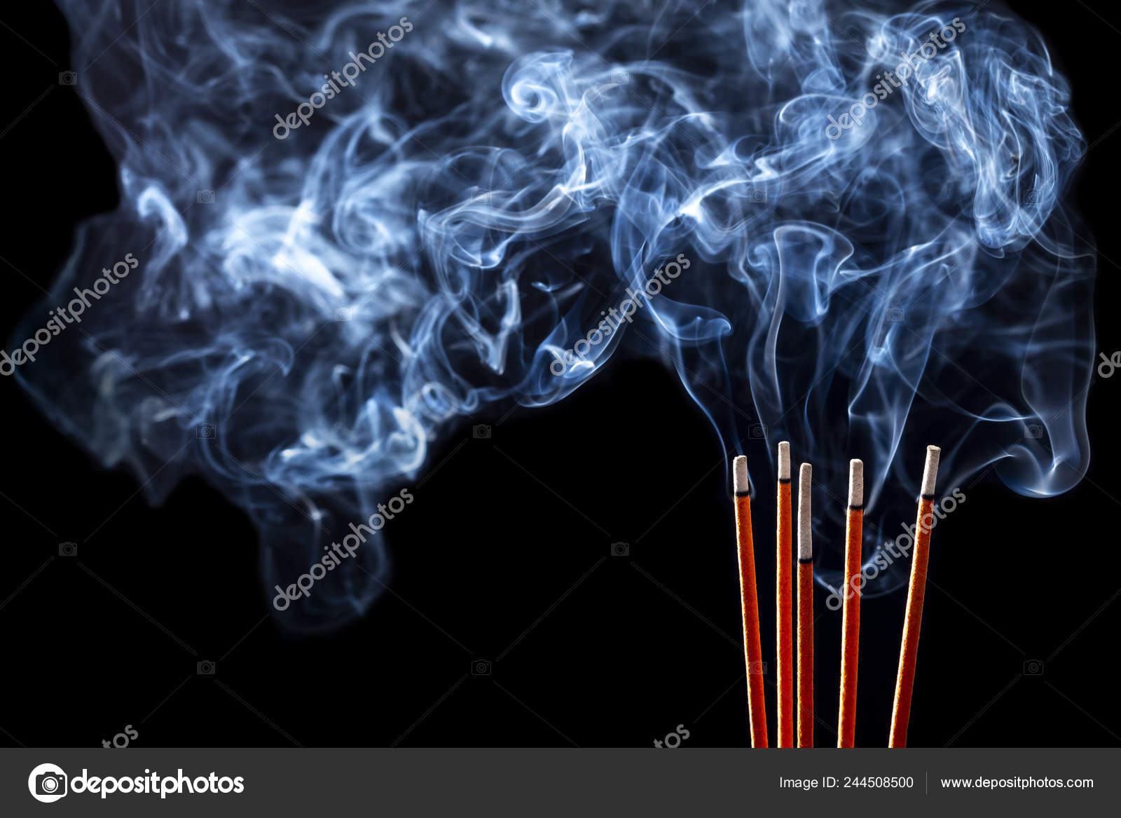 Burning Incense Sticks In The Large Ashtray Stock Photo, Picture and  Royalty Free Image. Image 98253544.