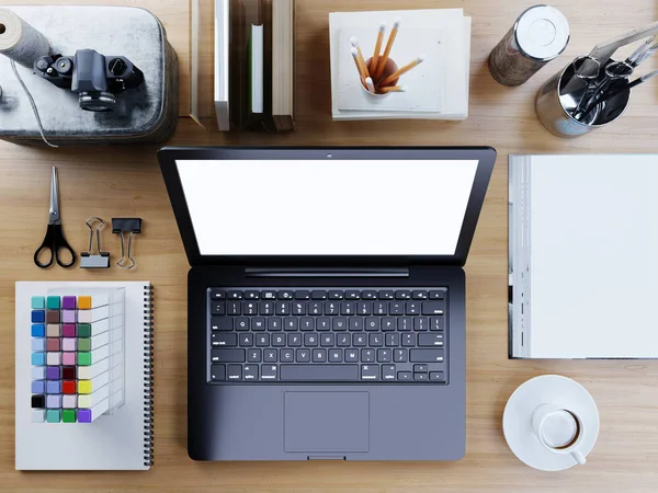 Responsive design mockup laptop top view. The laptop on a wooden table among the decor. 3D render.