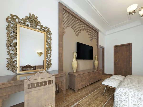 A TV on the wall and a TV stand with a dressing table, wooden carvings framed in Middle Eastern Arabic style. 3D rendering.