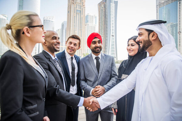 Multicultural business people meeting and talking about business - Multiracial business team meeting