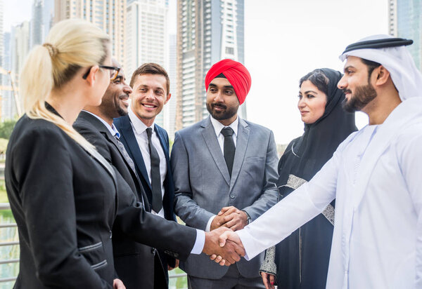 Multicultural business people meeting and talking about business - Multiracial business team meeting