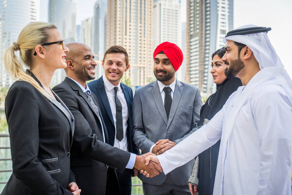 Multicultural business people meeting and talking about business - Multiracial business team meeting