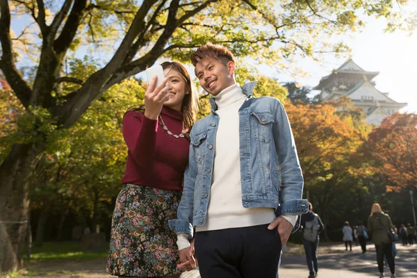 Young Japanese Couple Dating Outdoors — Stock Photo, Image