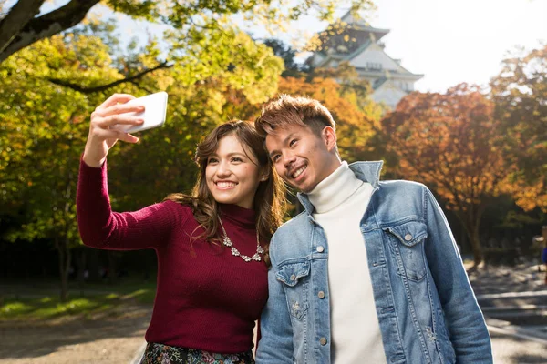 Young Japanese Couple Dating Outdoors — Stock Photo, Image