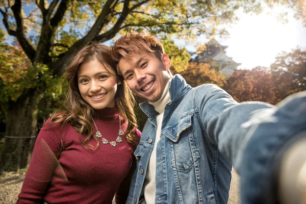 Young Japanese Couple Dating Outdoors — Stock Photo, Image