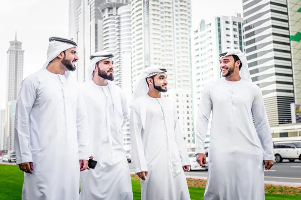 Arabian men meeting and talking about business - Businessmen portrait in Dubai