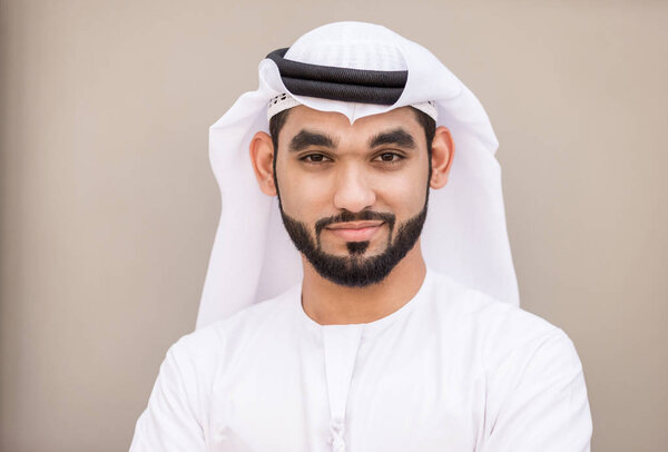 Arabian businessman portrait on grey background