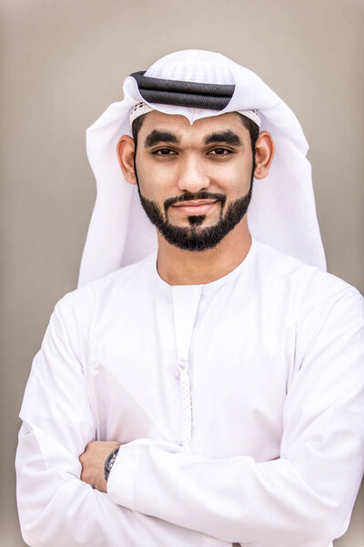 Arabian businessman portrait on grey background