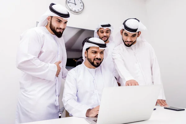 Arabian men meeting and talking about business - Businessmen portrait in Dubai