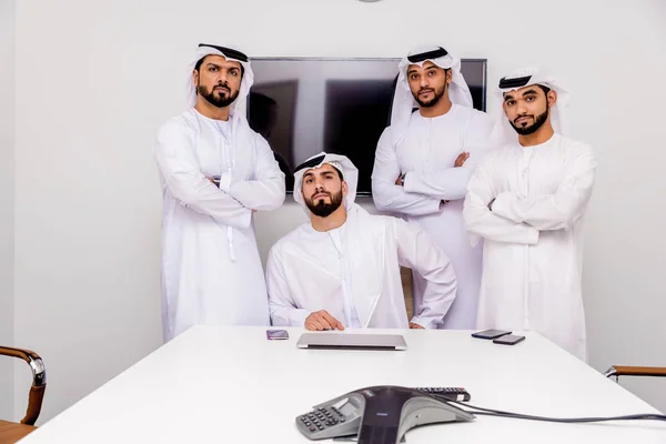 Arabian men meeting and talking about business - Businessmen portrait in Dubai