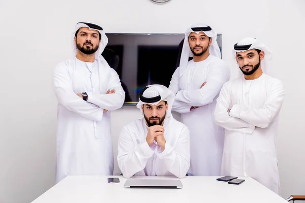 Arabian men meeting and talking about business - Businessmen portrait in Dubai