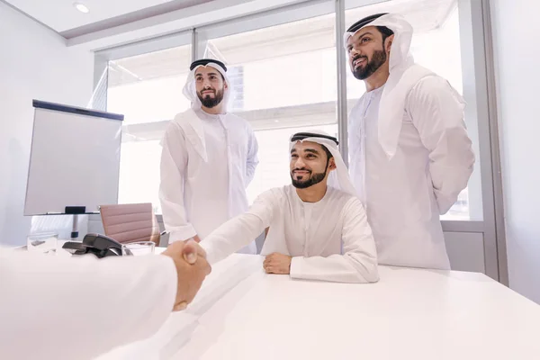 Arabian men meeting and talking about business - Businessmen portrait in Dubai