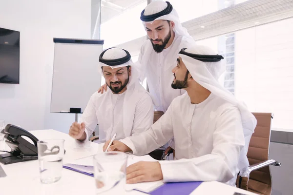 Arabian men meeting and talking about business - Businessmen portrait in Dubai