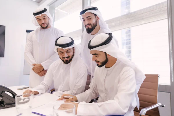 Arabian men meeting and talking about business - Businessmen portrait in Dubai