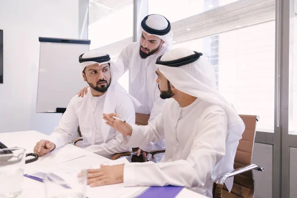 Arabian men meeting and talking about business - Businessmen portrait in Dubai