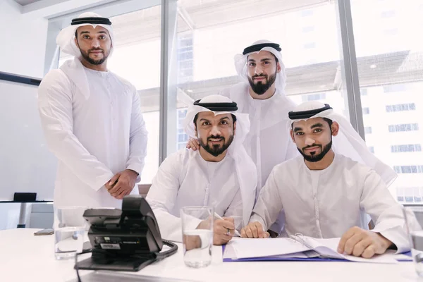 Arabian men meeting and talking about business - Businessmen portrait in Dubai