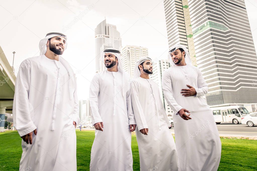 Arabian men meeting and talking about business - Businessmen portrait in Dubai