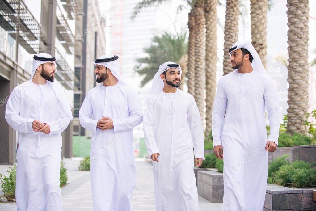 Arabian men meeting and talking about business - Businessmen portrait in Dubai