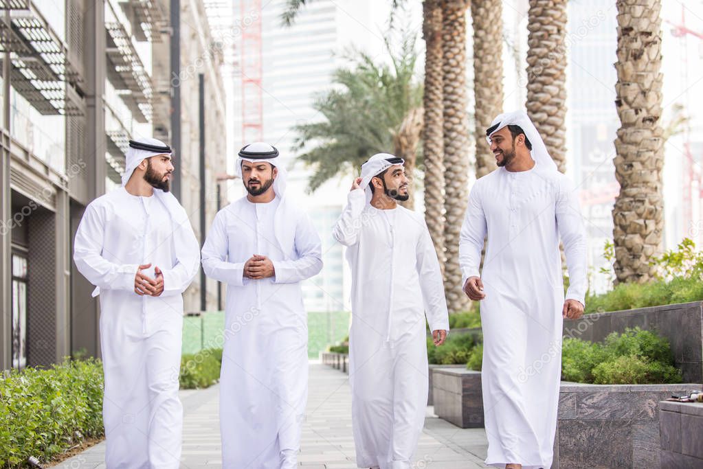 Arabian men meeting and talking about business - Businessmen portrait in Dubai