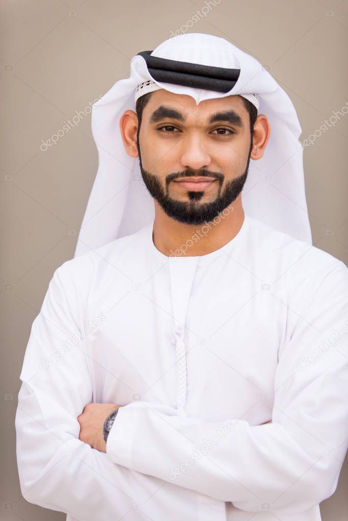 Arabian businessman portrait on grey background
