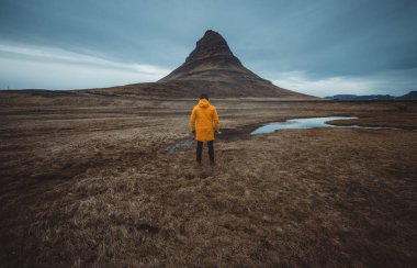 Man exploring icelandic lands clipart