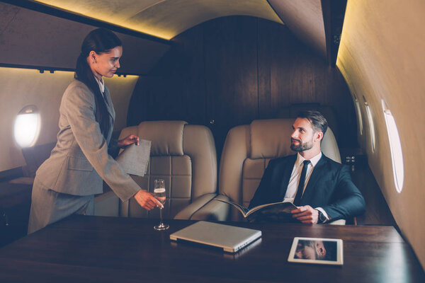 Businessman flying on his private jet