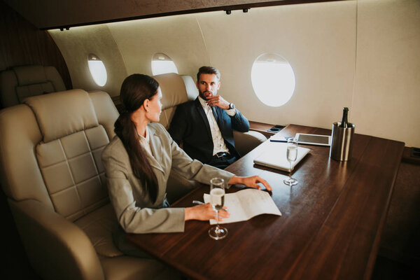 Business team on the private jet