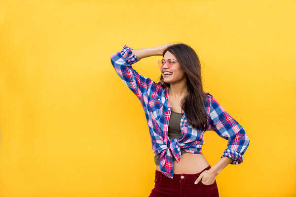 Portrait of stylish pretty girl on colored background - Happy woman with urban styled attire, concepts about lifestyle and youth
