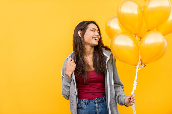 Portrait of stylish pretty girl on colored background - Happy woman with urban styled attire, concepts about lifestyle and youth