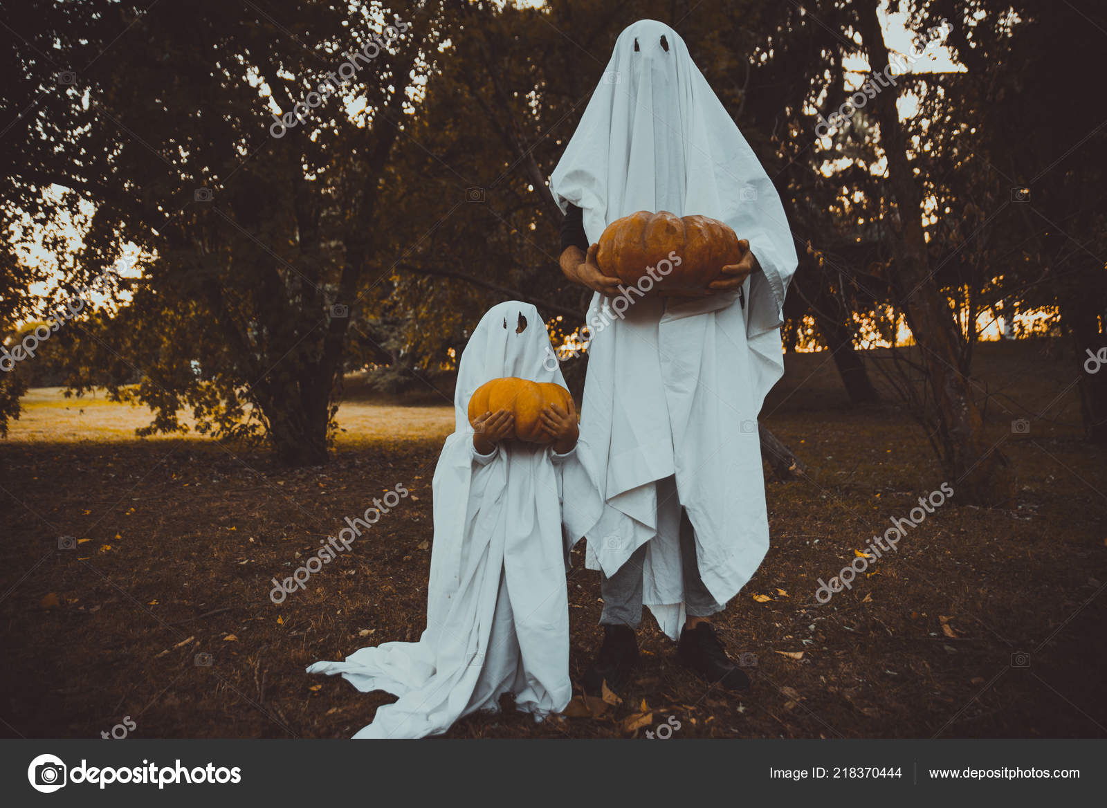 Father Son Playing Ghosts White Sheets Garden Conceptual - 