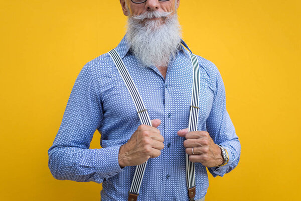 Handsome senior man portrait - Youthful and stylish man in the sixties, concepts about lifestyle, seniors and business