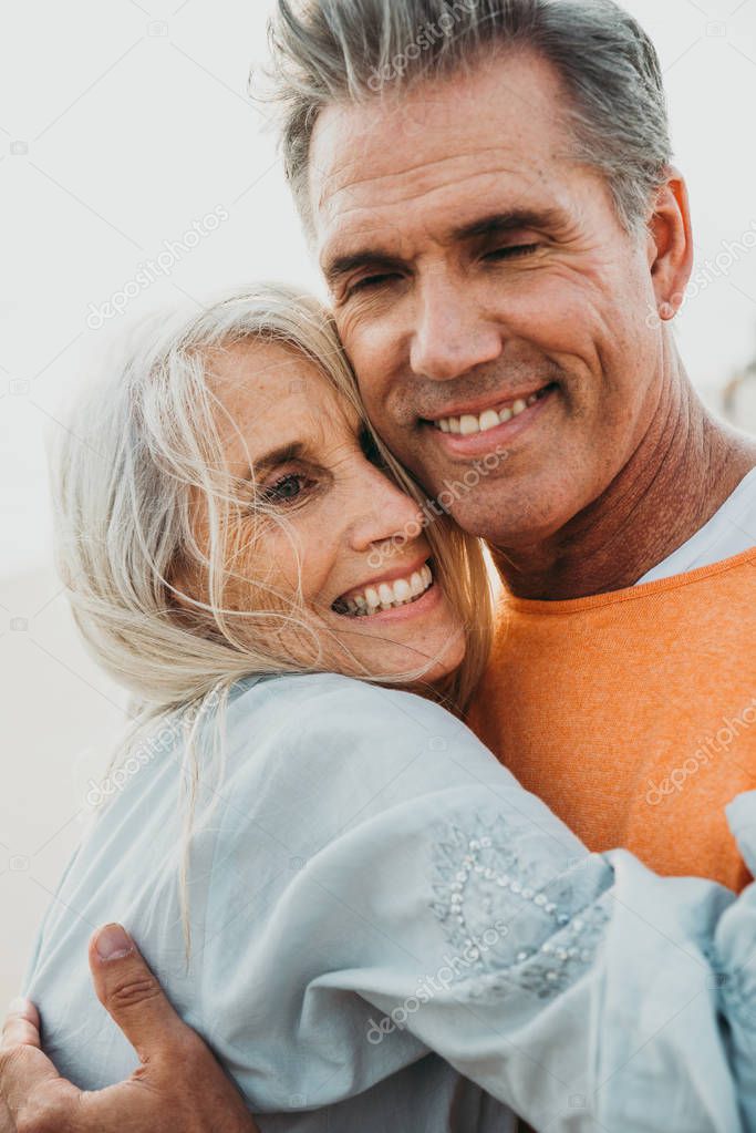 Happy senior couple spending time at the beach. Concepts about love,seniority and people