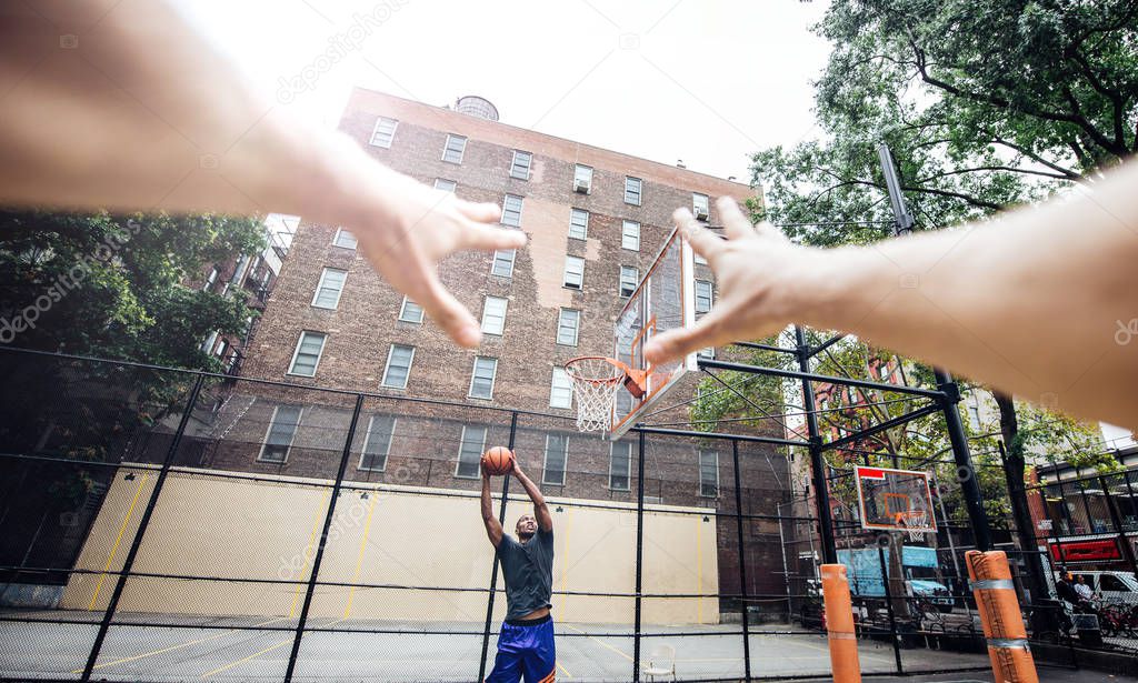 Basketball player training on a court in New york city