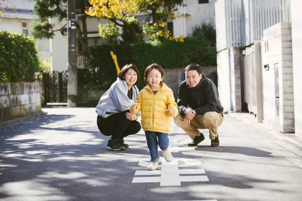 Happy Playful Japanese Family Small Cute Daughter Having Fun Outdoors — Stock Photo, Image