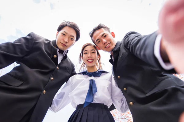 Yung Japanese Students School Uniform Bonding Outdoors Group Asian Teenagers — стоковое фото
