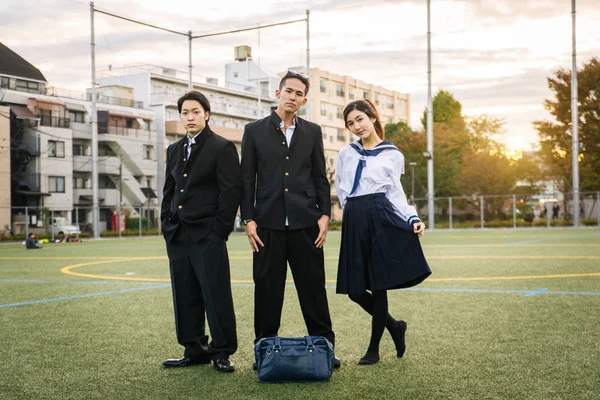 Yung Japanese Students School Uniform Bonding Outdoors Group Asian Teenagers — стоковое фото