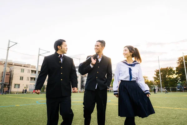 Yung Japanese Students School Uniform Bonding Outdoors Group Asian Teenagers — стоковое фото