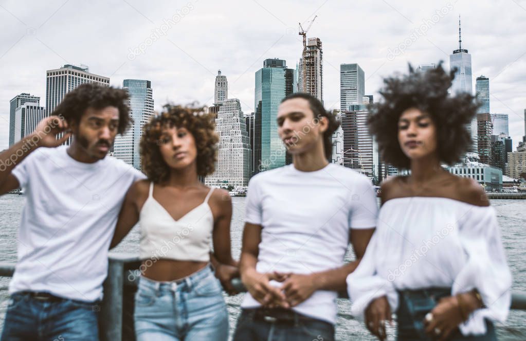 Group of friends spending time togeher in New york city, blurry artistic shot