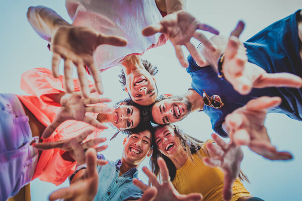 Young happy people having a barbecue dinner on a rooftop in New York - Group of friends having party and having fun