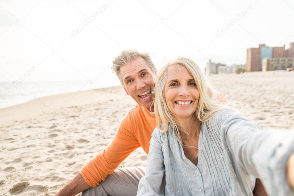 Beautiful happy senior couple dating outdoors - Youthful married couple having fun and enjoying life together