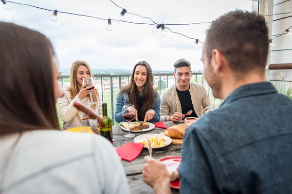 Friends having lunch at home — Stock Photo, Image